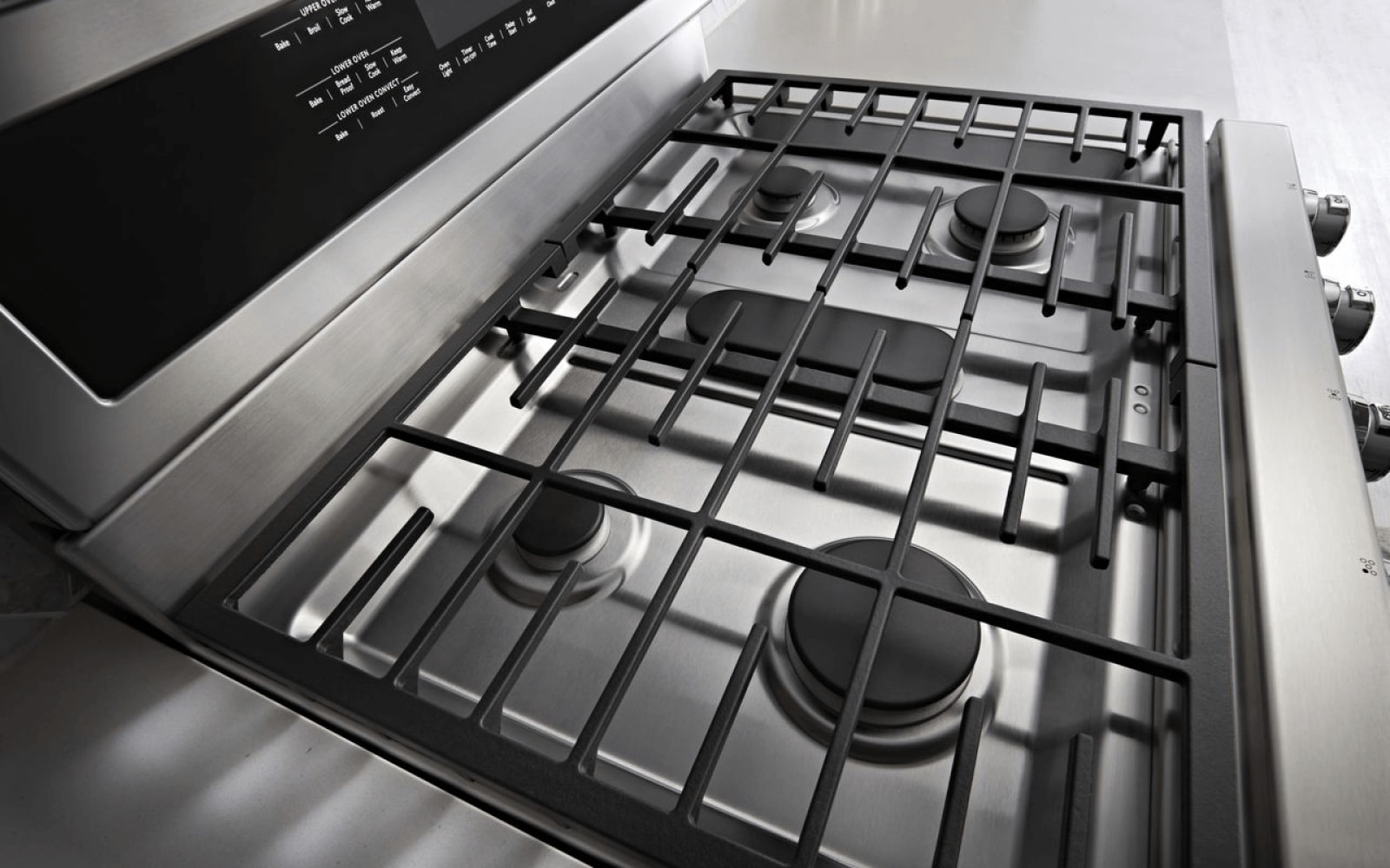 An image of a stainless steel gas cooktop. An image of a stainless steel gas cooktop.