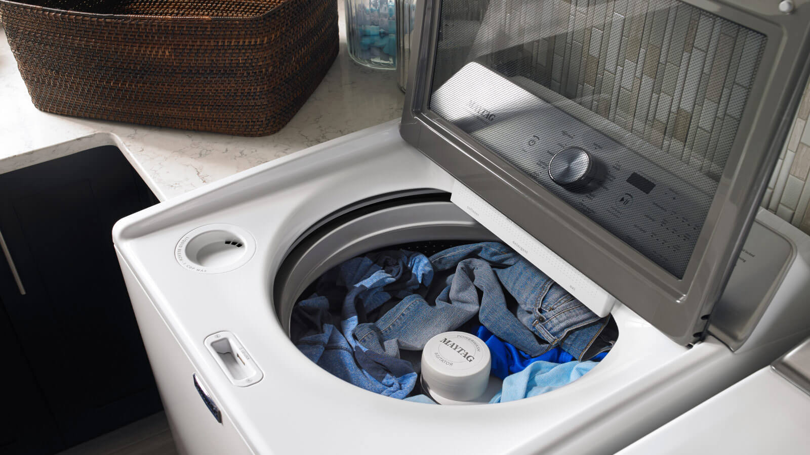Clothes inside a Maytag® top load washer Clothes inside a Maytag® top load washer