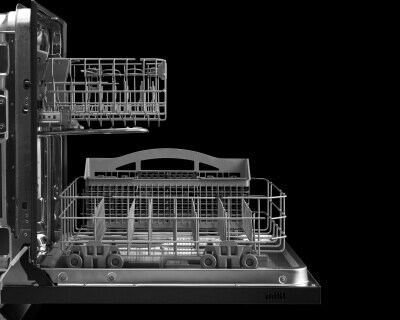 Side view of Maytag® dishwasher with racks pulled out