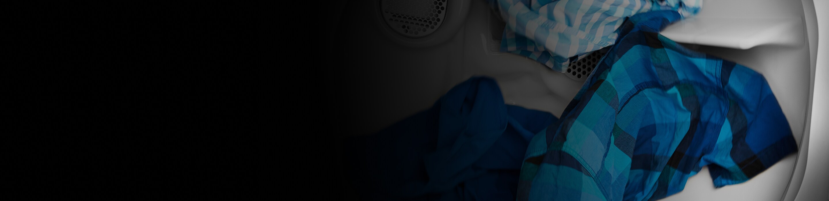 Clothes tumbling in a dryer.