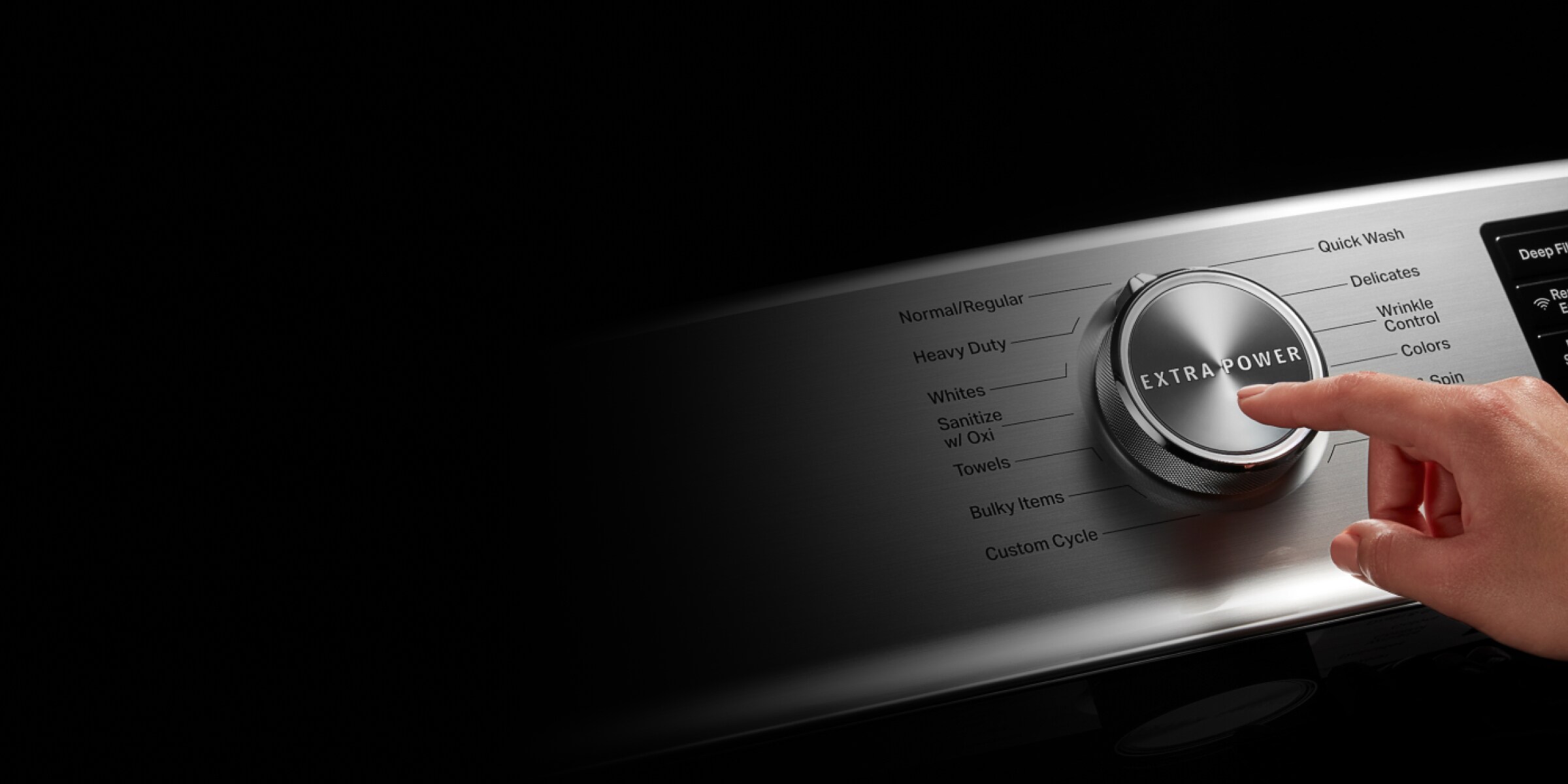 Person choosing a cycle on a Maytag® washing machine