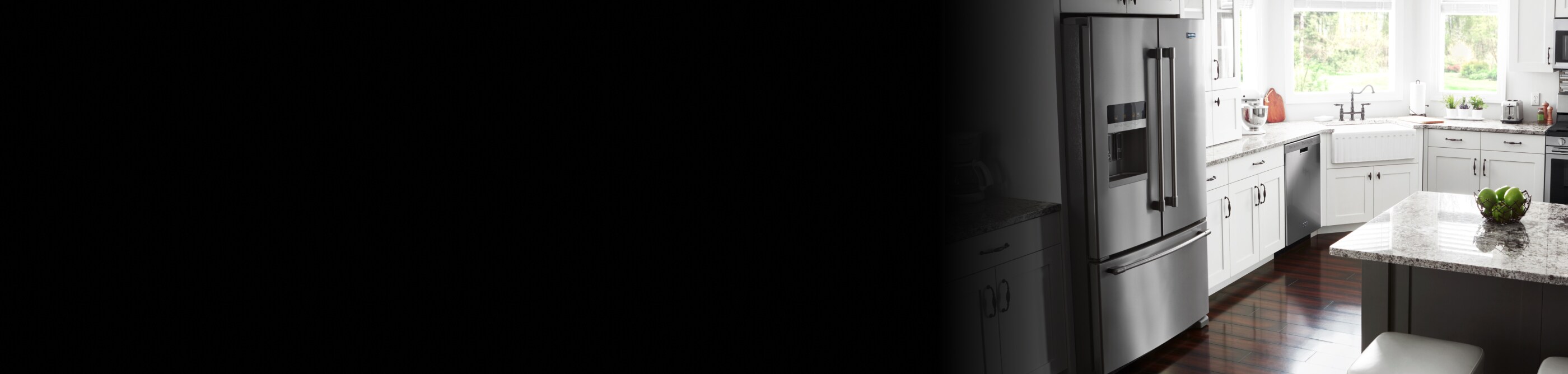 A kitchen featuring a Maytag® refrigerator and freezer.