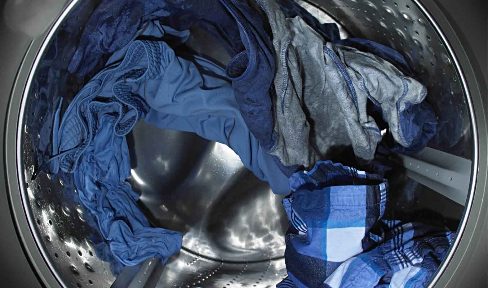 Wet clothes tumbling in washer