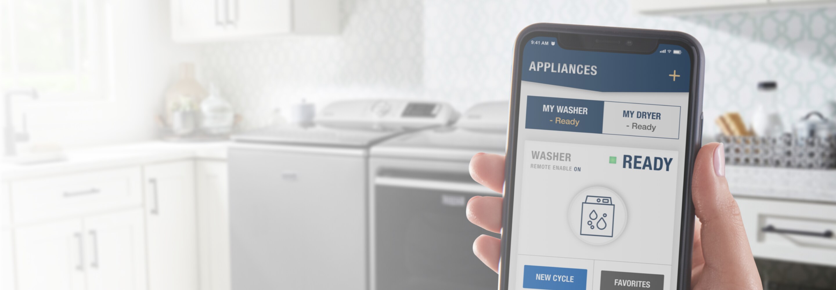 A hand holding a phone with the Maytag™ App opened.