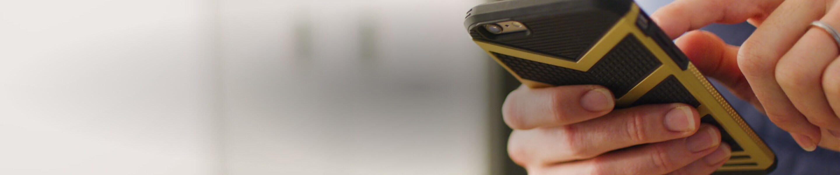 A person using a smart phone device.