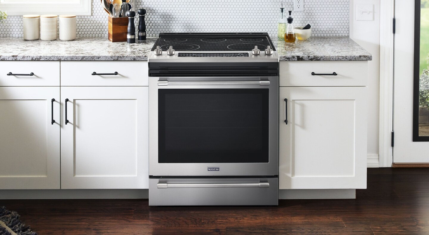 Maytag® electric range set in cabinetry Maytag® electric range set in cabinetry