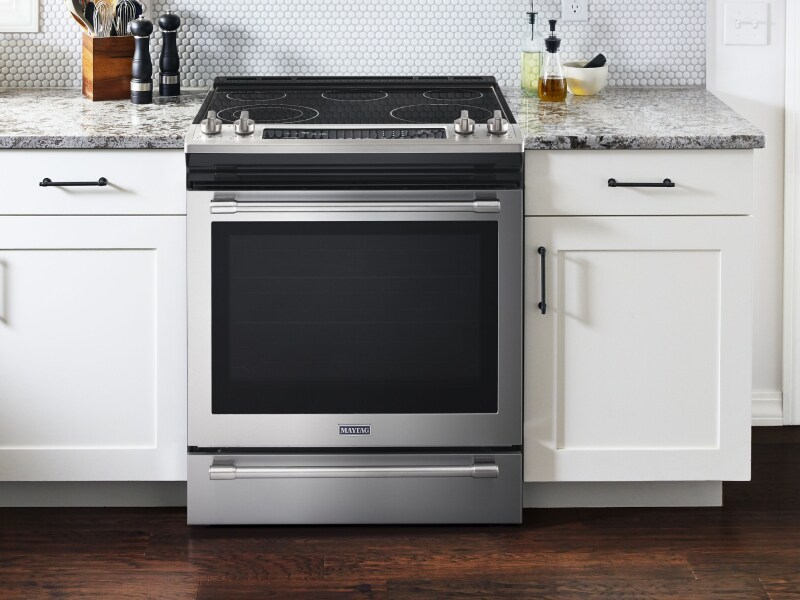 Maytag® electric range set in cabinetry Maytag® electric range set in cabinetry