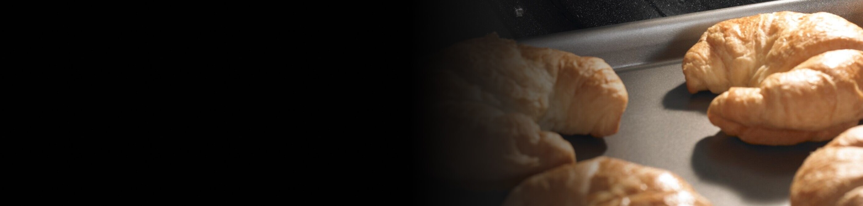 Croissants baking in an oven