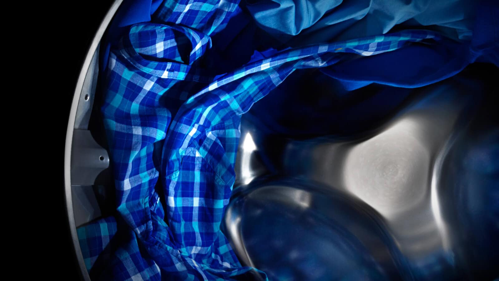 Maytag® dryer tumbling blue clothes Maytag® dryer tumbling blue clothes