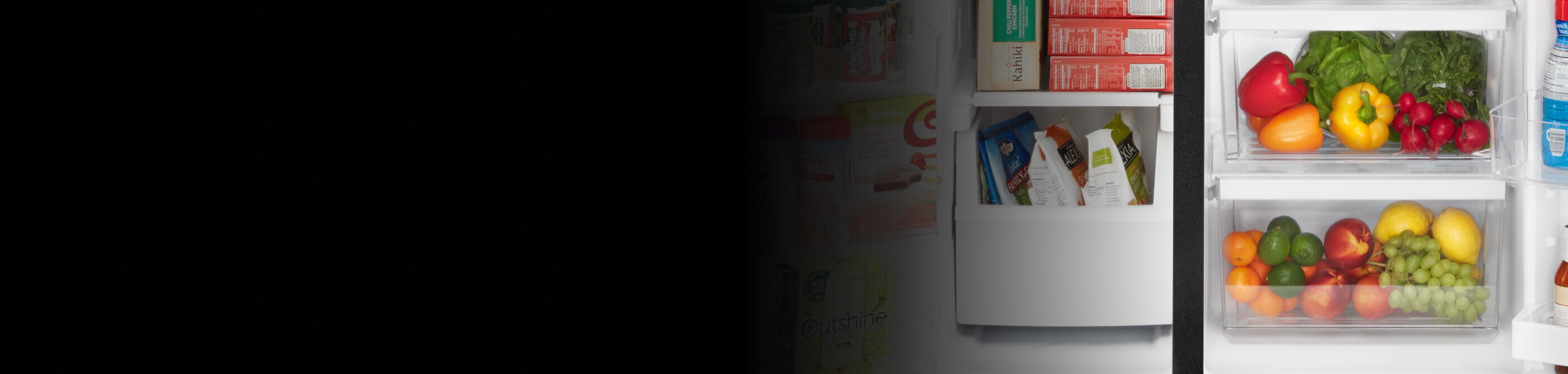 Close-up of produce and frozen food in side-by-side refrigerator