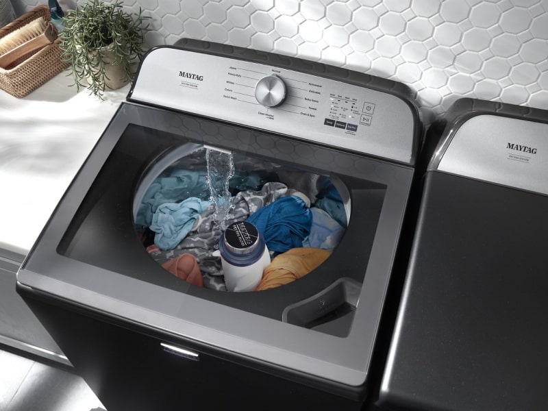 Clothes washing in a top load washing machine