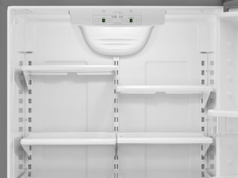 Empty refrigerator shelves