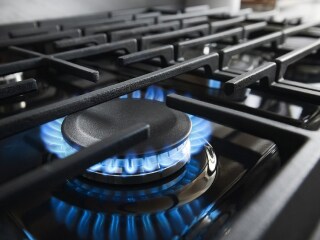 Closeup image of a gas burner on a cooktop