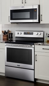 Range hood over a range