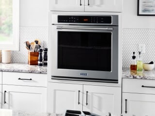 Single wall oven in a white kitchen