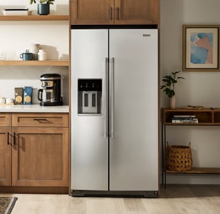 A stainless steel refrigerator in a modern kitchen