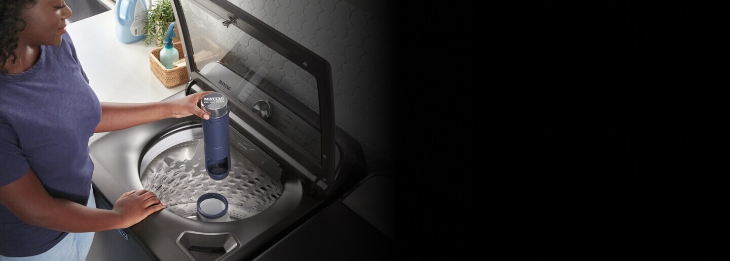 Person holding the Maytag® Pet Pro Filter