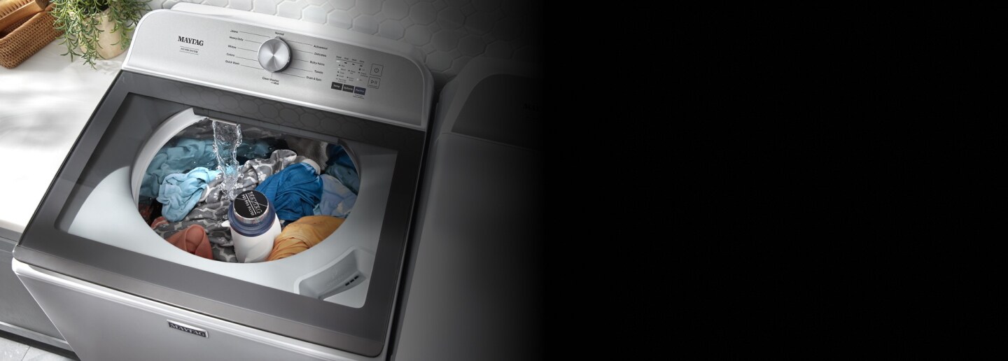 Maytag® top load washer filled with laundry