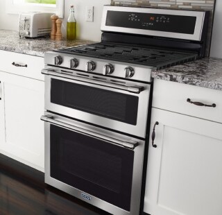 Double oven gas range in a modern kitchen