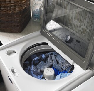 Laundry in a top load Maytag® washer