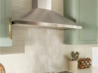 Steam collecting under a stainless steel range hood