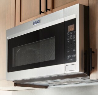 Side view of a Maytag® over-the-range microwave