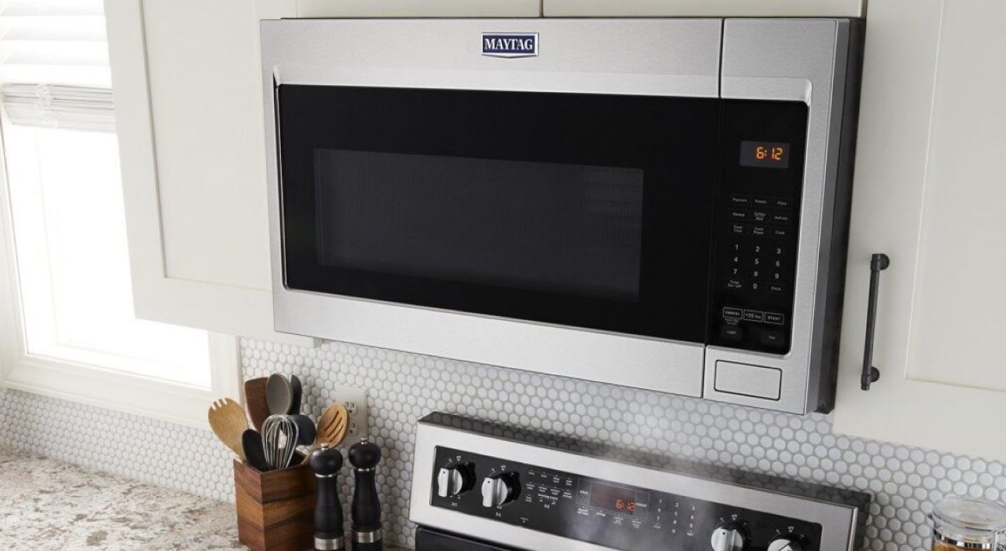 An over-the-range Maytag® microwave and oven in a modern kitchen An over-the-range Maytag® microwave and oven in a modern kitchen