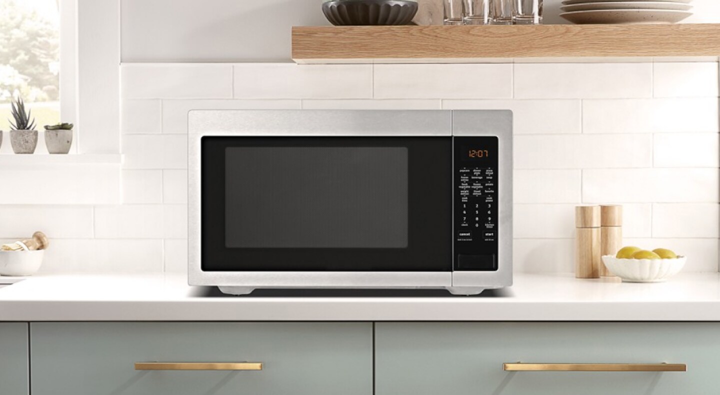 A countertop Maytag® microwave in a modern kitchen A countertop Maytag® microwave in a modern kitchen