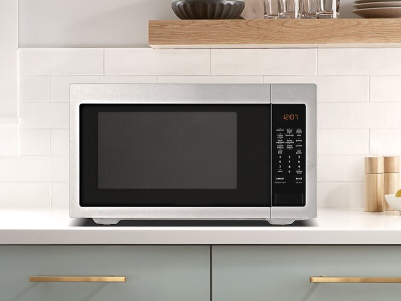 A countertop Maytag® microwave in a modern kitchen A countertop Maytag® microwave in a modern kitchen