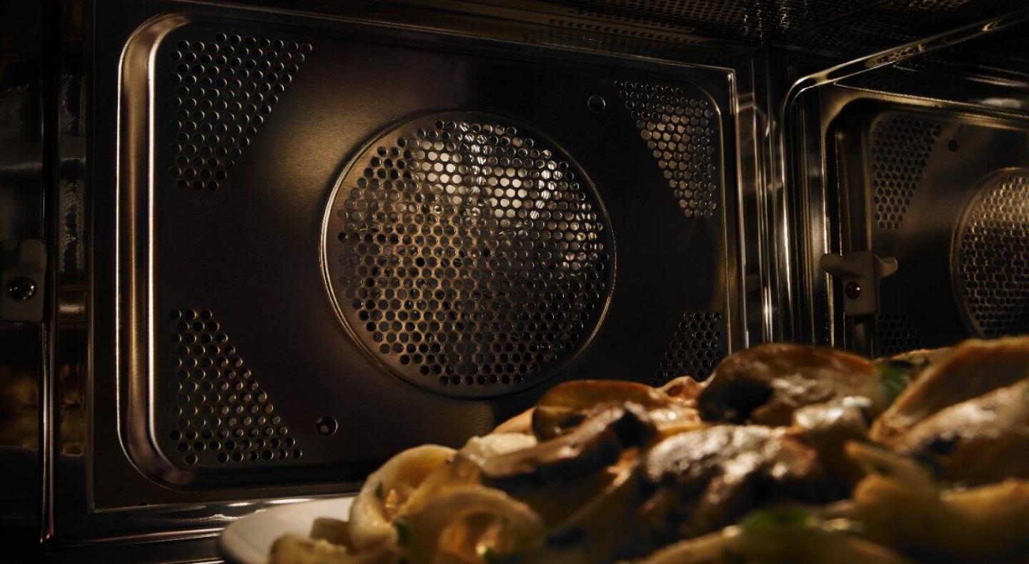 A closeup of the interior of a built-in Maytag® microwave A closeup of the interior of a built-in Maytag® microwave