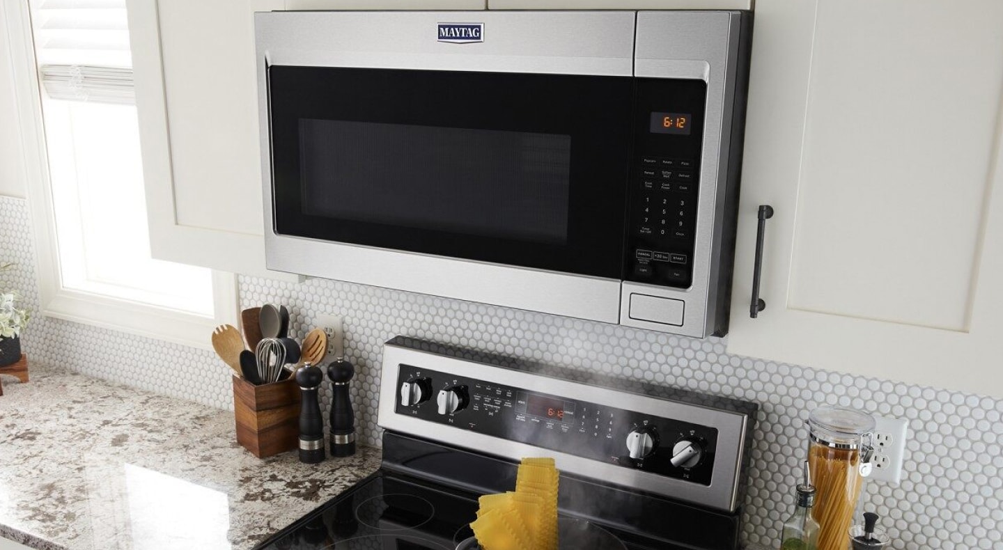 Maytag® microwave hood combination over Maytag® range Maytag® microwave hood combination over Maytag® range