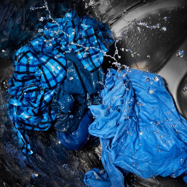 Clothes tumbling in a washing machine