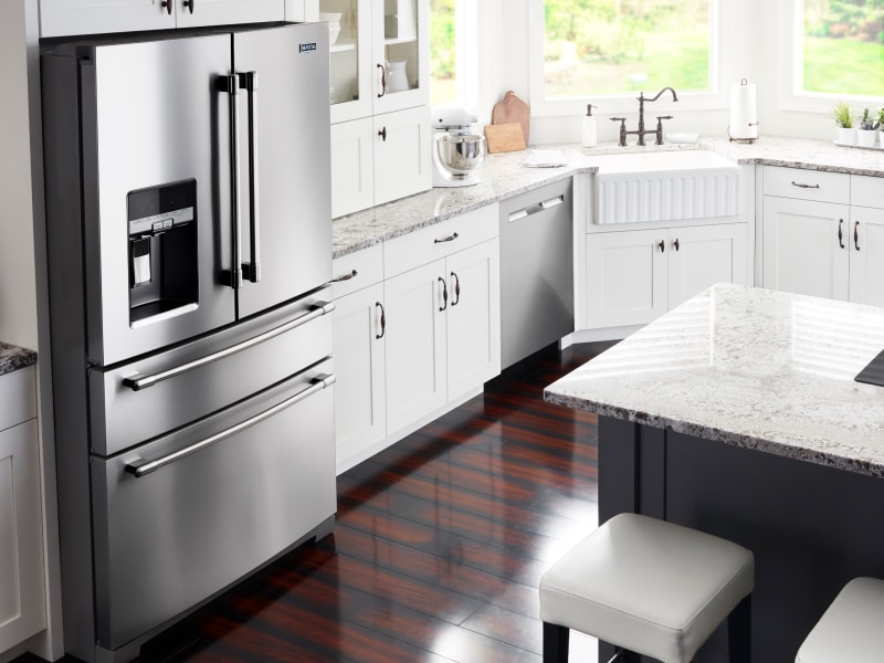 Kitchen view with a Maytag brand refrigerator with a soft freeze drawer