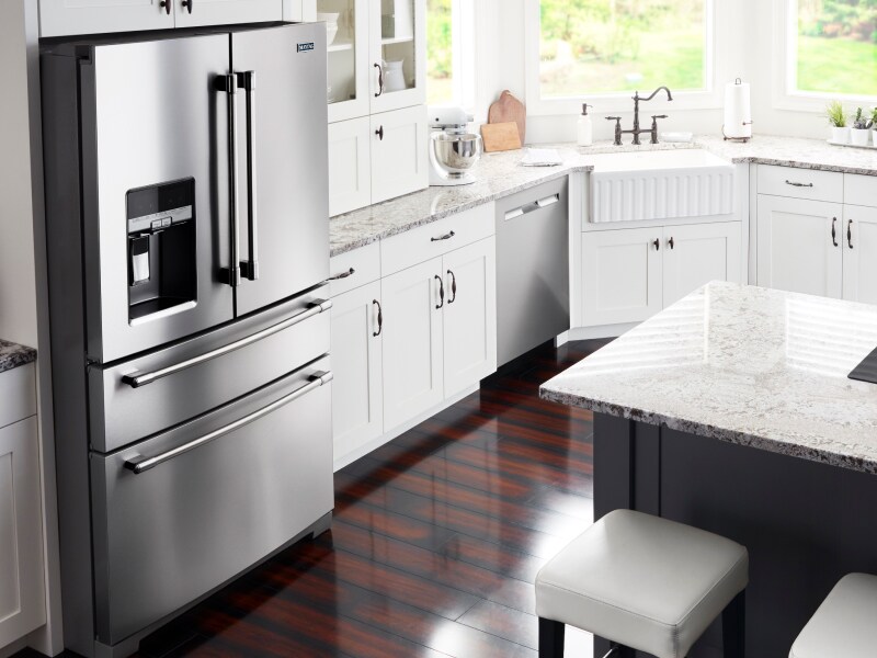  Kitchen view with a Maytag brand refrigerator with a soft freeze drawer