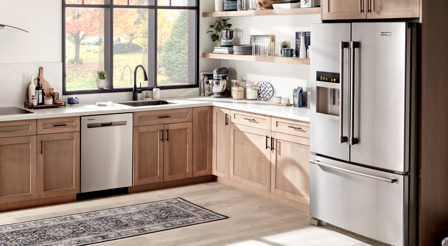 Urban modern kitchen featuring Maytag brand appliances