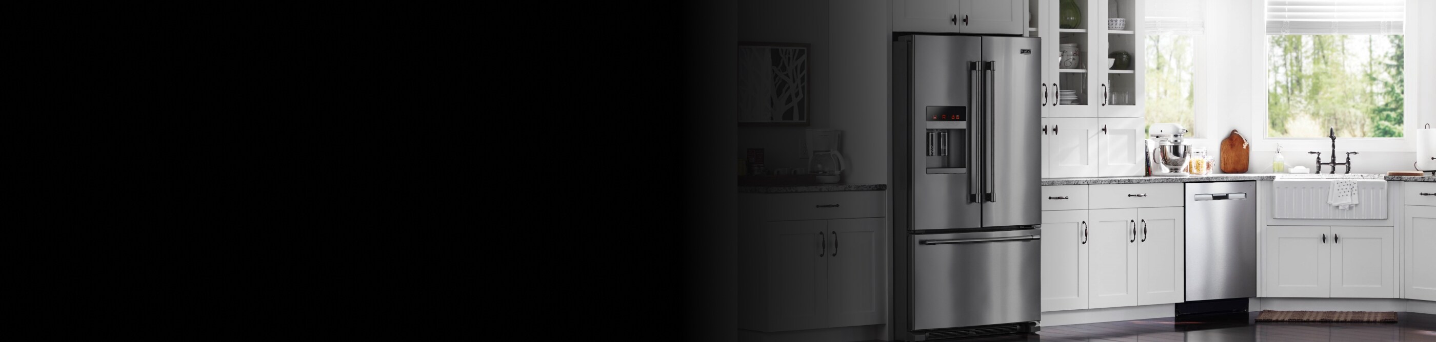 Farmhouse style kitchen featuring a stainless steel French door refrigerator