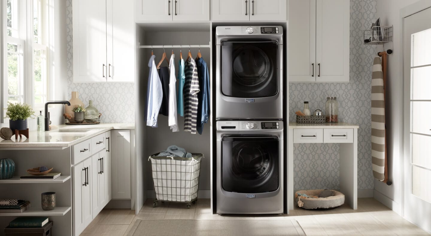 A Maytag® front load washer and dryer in a modern laundry room