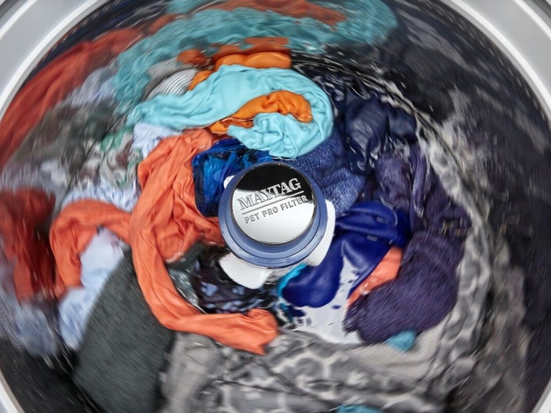 Inside view of active washing machine Inside view of active washing machine
