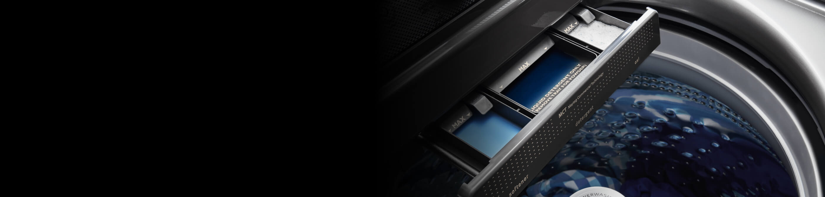 An open detergent dispenser on a washer