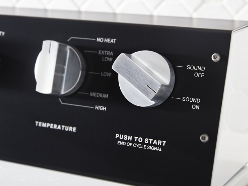 Close-up of dryer setting knobs