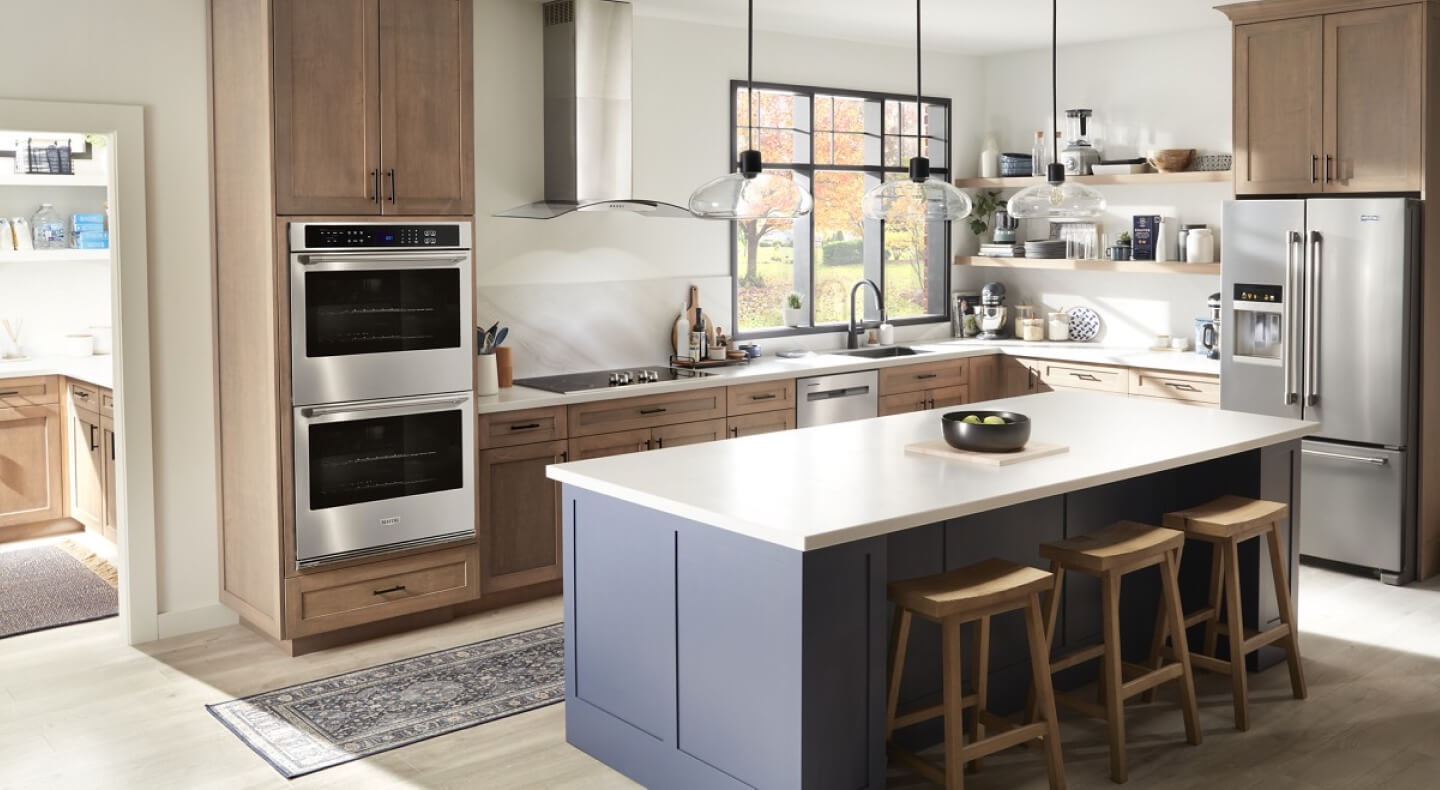 Maytag® double wall oven in an open kitchen