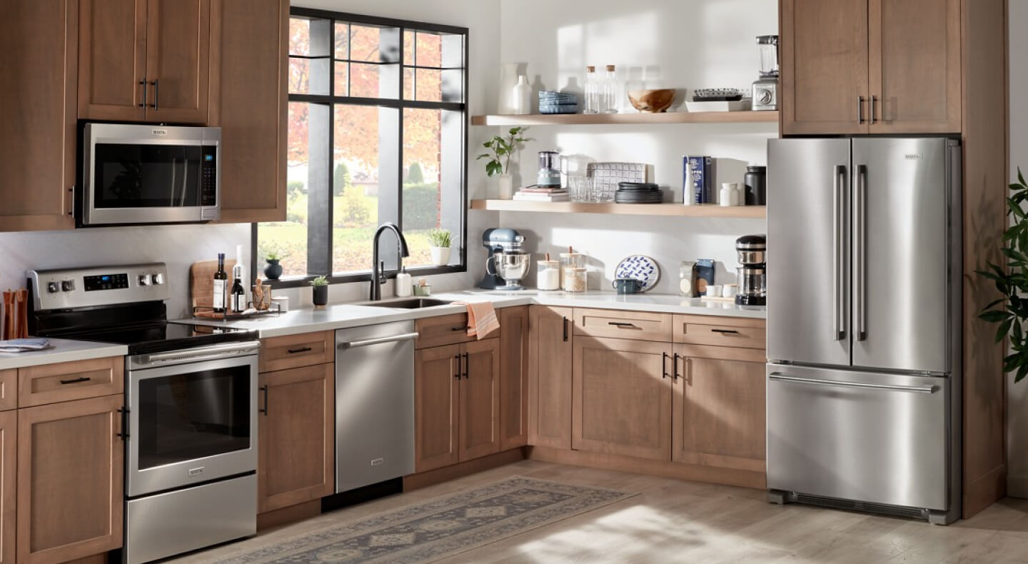 Bright kitchen with stainless steel Maytag® appliances