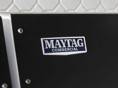 Maytag logo on a washing machine