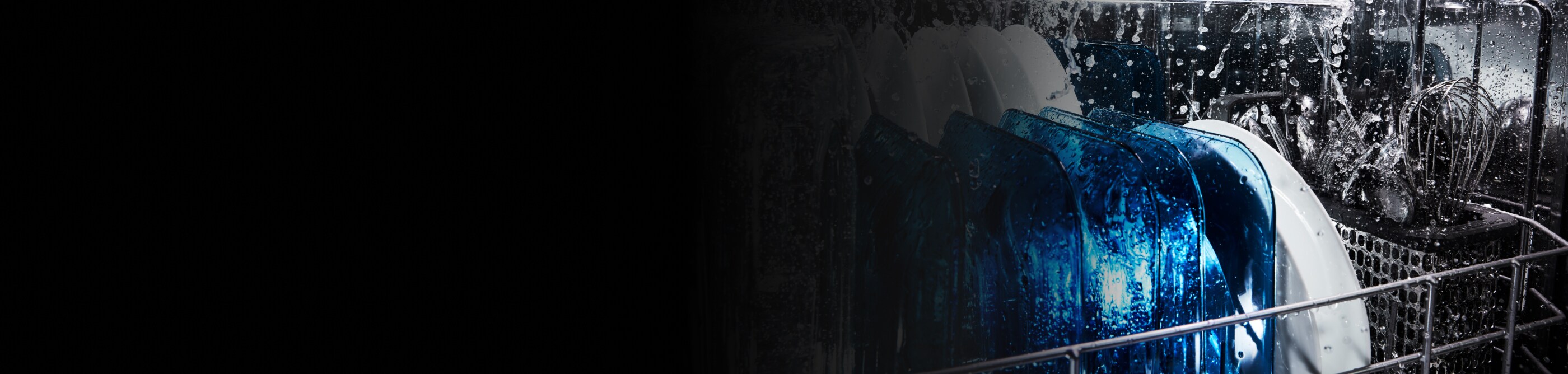 Dishes washing on the bottom rack of a dishwasher