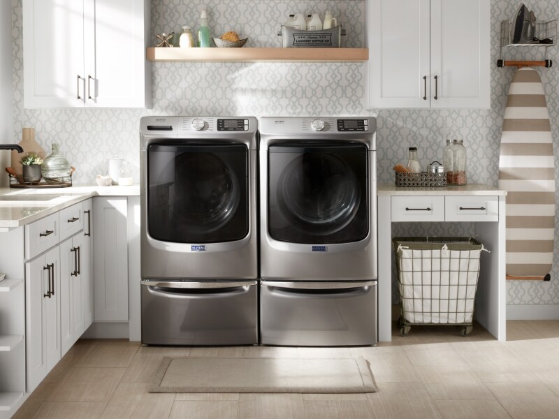 Maytag® washer and dryer installed on laundry pedestals Maytag® washer and dryer installed on laundry pedestals