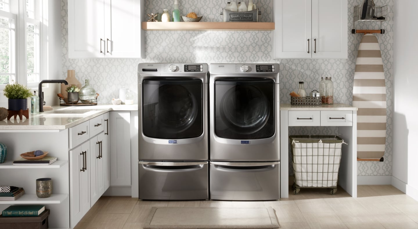 Maytag® washer and dryer installed on laundry pedestals Maytag® washer and dryer installed on laundry pedestals