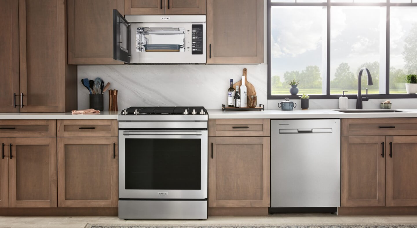 Kitchen with stainless steel Maytag® appliances