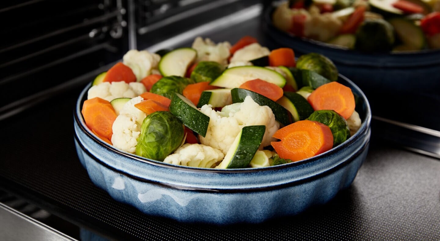 Blue bowl of mixed vegetables Blue bowl of mixed vegetables