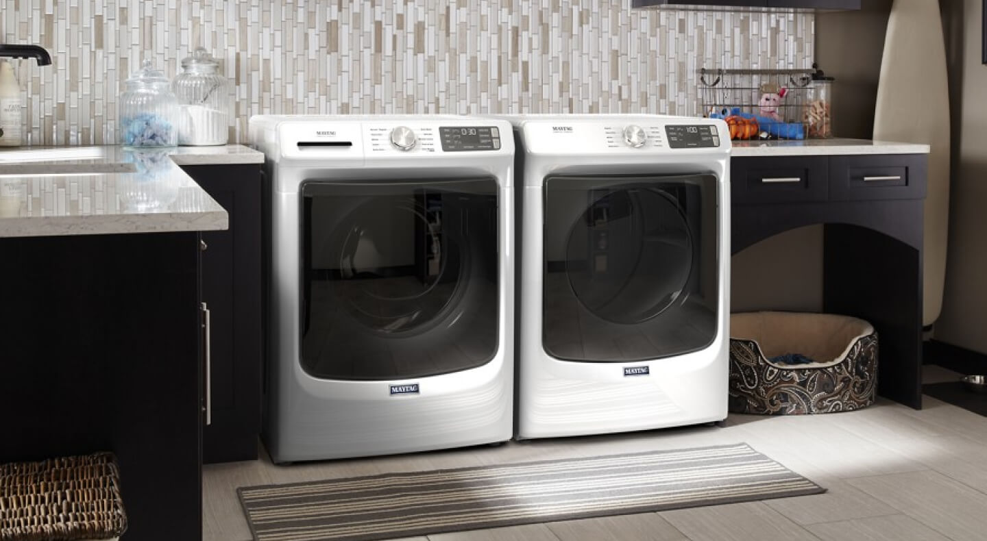 Maytag® washer and dryer in a modern laundry room