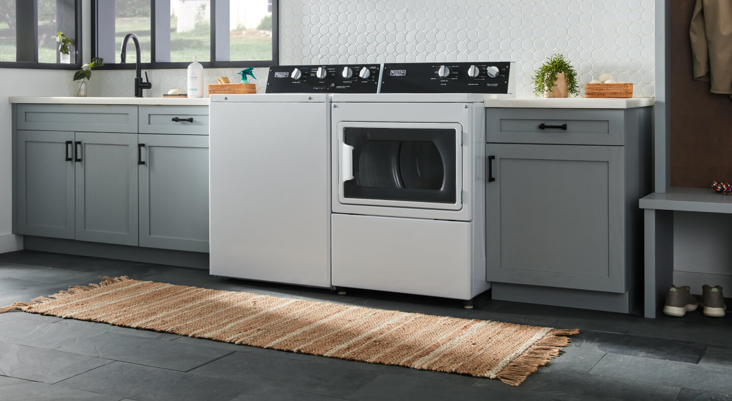 A Maytag® commercial-grade set in a laundry room